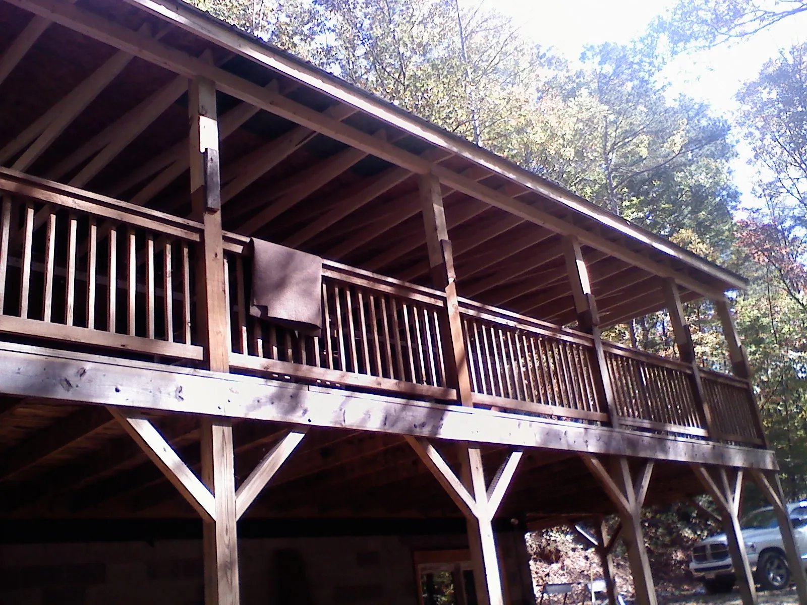 Timber framing under a new elevated porch and deck — Roof Leak Repair in Romeoville by Roofing Brothers